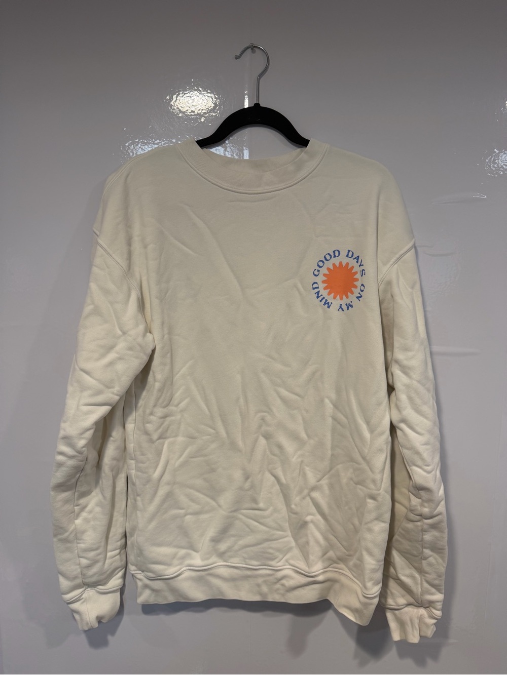 Cream Graphic Crewneck Sweatshirt with Orange Sun Sunny Days Ahead Motif